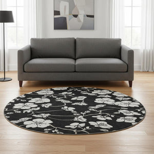 HomeRoots 8' Black and Ivory Floral Round Rug - Durable, Washable with UV Protection for Stylish Living Spaces 681014