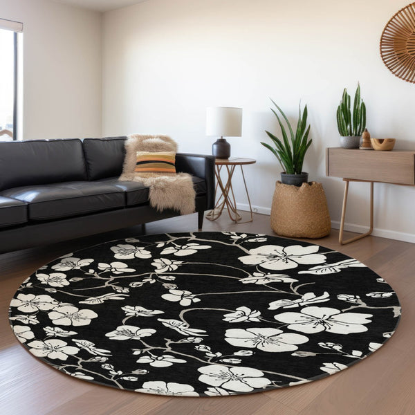 HomeRoots 8' Black and Ivory Floral Round Rug - Durable, Washable with UV Protection for Stylish Living Spaces 681014