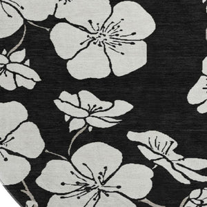 HomeRoots 8' Black and Ivory Floral Round Rug - Durable, Washable with UV Protection for Stylish Living Spaces 681014