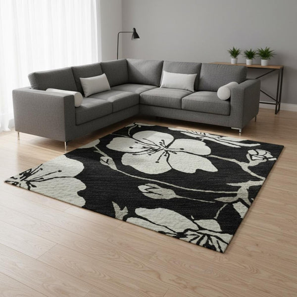 HomeRoots 8' X 10' Black And Ivory Floral Area Rug – Stylish, Washable, UV-Protected for Family-Friendly Spaces 681015