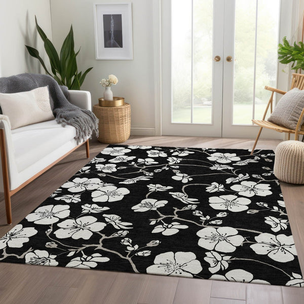 HomeRoots 10' X 14' Black and Ivory Floral Area Rug - Durable, Washable, UV-Protected for Stylish Living Spaces 681017