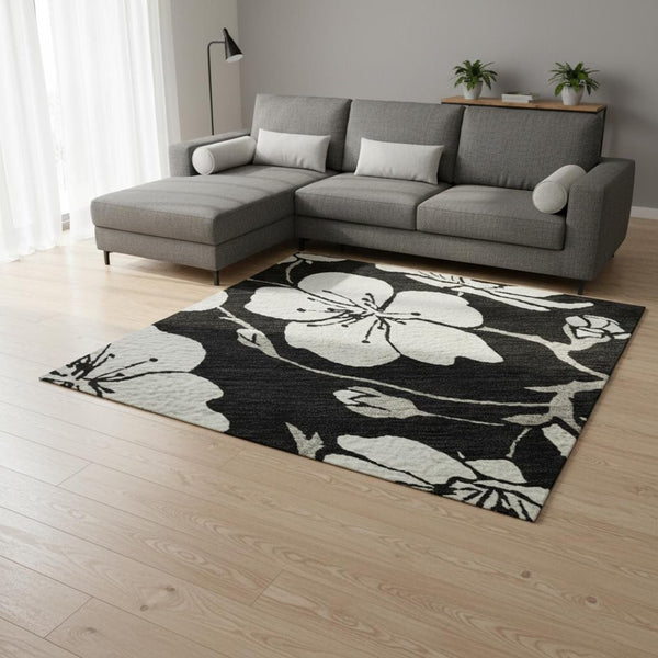 HomeRoots 10' X 14' Black and Ivory Floral Area Rug - Durable, Washable, UV-Protected for Stylish Living Spaces 681017
