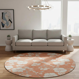 HomeRoots 8' Coral and Ivory Floral Round Rug - Washable, UV Protected, Durable for Homes with Kids & Pets 681026