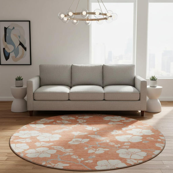 HomeRoots 8' Coral and Ivory Floral Round Rug - Washable, UV Protected, Durable for Homes with Kids & Pets 681026