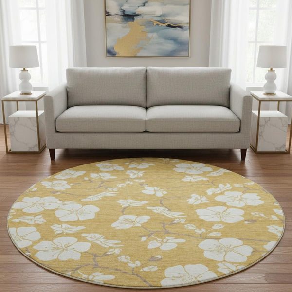 HomeRoots 8' Gold and Ivory Floral Round Rug - Stylish, Washable, UV-Protected, Perfect for Family Spaces! 681032