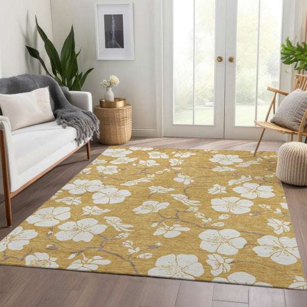 HomeRoots 9' X 12' Floral Washable Area Rug in Gold & Ivory - UV Protected, Durable, Stain-Resistant Design 681034