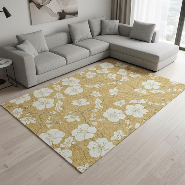 HomeRoots 10' X 14' Gold And Ivory Floral Area Rug - Washable, Durable, UV Protected for Stylish Living Spaces 681035