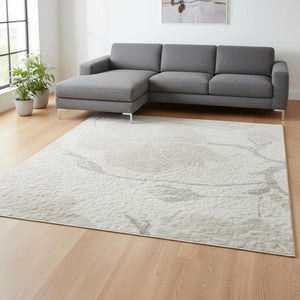 HomeRoots 8' X 10' Ivory & Beige Floral Area Rug - Washable, Stain-Resistant, UV Protection for High-Traffic Areas 681045