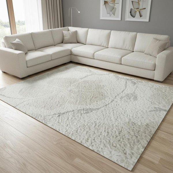 HomeRoots 9' X 12' Elegant Ivory and Beige Floral Area Rug - Washable, UV Protected, Kid & Pet Friendly Design 681046