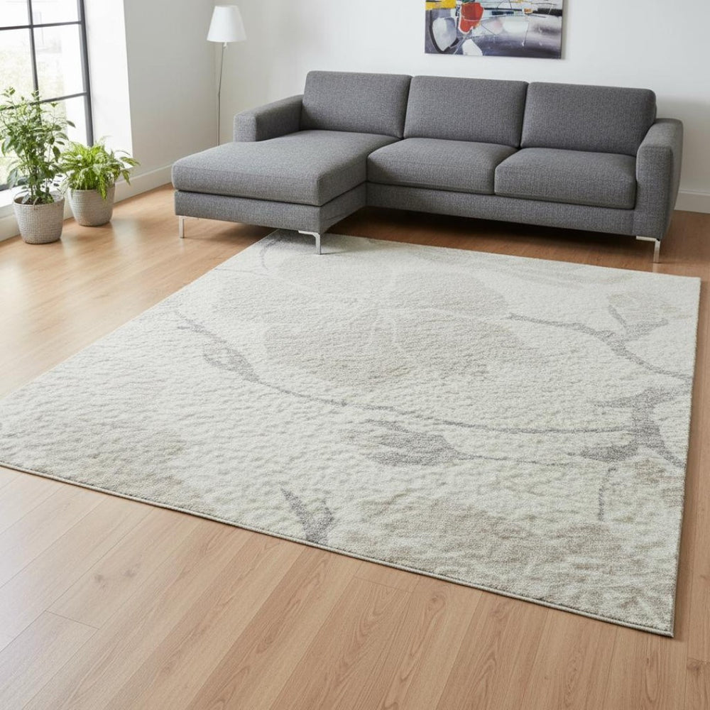 HomeRoots 10' X 14' Ivory and Beige Floral Area Rug – Washable, UV Protected, Durable & Stylish Home Essential 681047