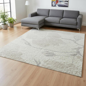 HomeRoots 10' X 14' Ivory and Beige Floral Area Rug – Washable, UV Protected, Durable & Stylish Home Essential 681047