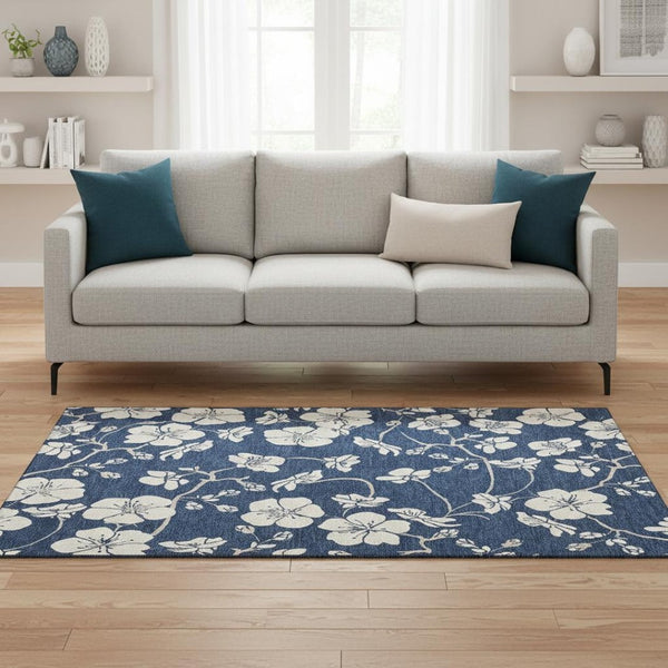 HomeRoots 5' X 8' Navy Blue Floral Area Rug – Washable, UV Protected & Stain Resistant for Home Decor Elegance 681049