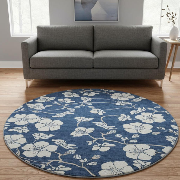 HomeRoots 8' Navy Blue and Ivory Floral Washable Round Rug - UV Protected, Durable Design for High-Traffic Areas 681050