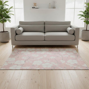 HomeRoots 5' X 8' Pink and Ivory Floral Area Rug - Washable, UV Protected, Stain Resistant, Perfect for Families 681055
