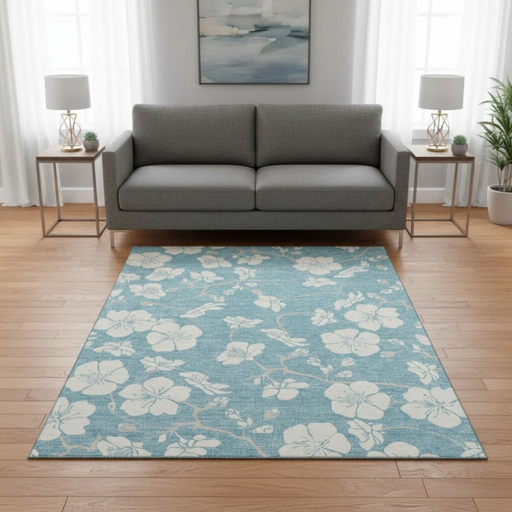 HomeRoots 5' X 8' Sky Blue & Ivory Floral Washable Area Rug - Durable, UV-Protected, Perfect for High-Traffic Spaces 681073