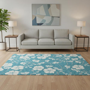 HomeRoots 5' X 8' Turquoise & Ivory Floral Area Rug - Washable, UV Protected, Stain Resistant for Any Space! 681079