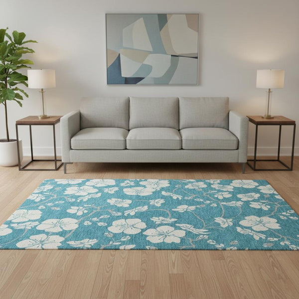 HomeRoots 5' X 8' Turquoise & Ivory Floral Area Rug - Washable, UV Protected, Stain Resistant for Any Space! 681079