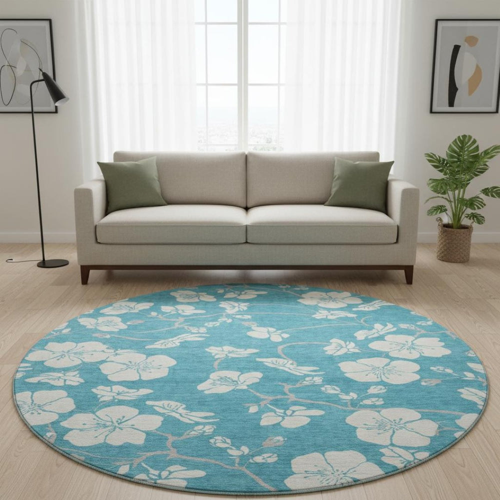 HomeRoots 8' Turquoise & Ivory Floral Washable Round Rug with Durable UV Protection for Everyday Elegance 681080