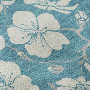 HomeRoots 8' Turquoise & Ivory Floral Washable Round Rug with Durable UV Protection for Everyday Elegance 681080