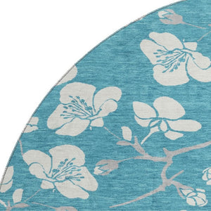 HomeRoots 8' Turquoise & Ivory Floral Washable Round Rug with Durable UV Protection for Everyday Elegance 681080