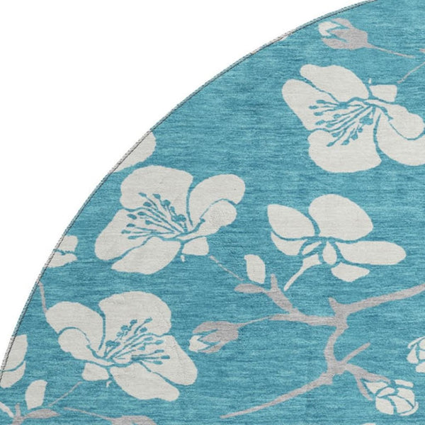 HomeRoots 8' Turquoise & Ivory Floral Washable Round Rug with Durable UV Protection for Everyday Elegance 681080