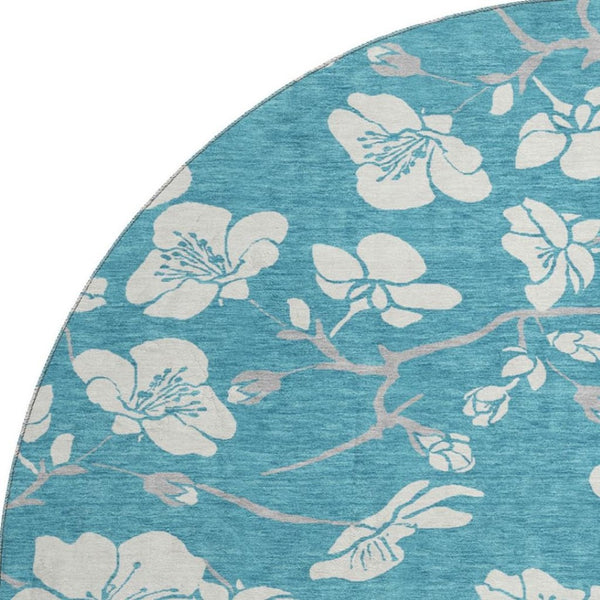 HomeRoots 8' Turquoise & Ivory Floral Washable Round Rug with Durable UV Protection for Everyday Elegance 681080