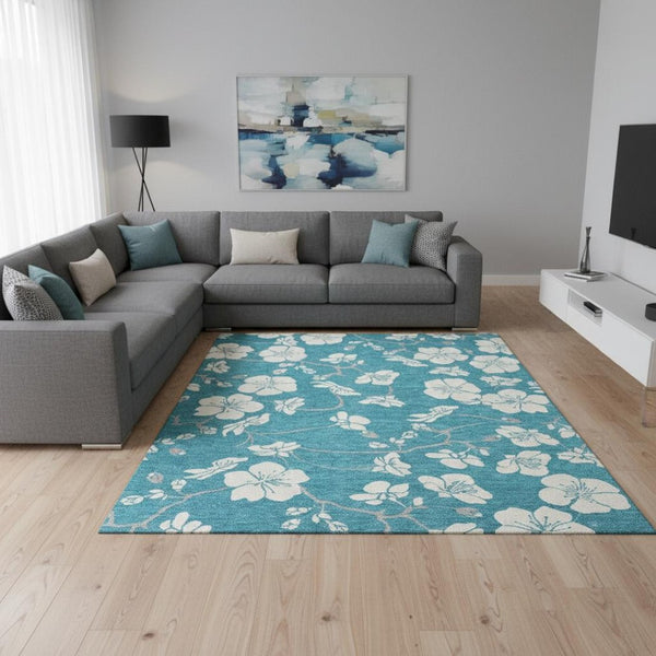 HomeRoots 10' X 14' Turquoise & Ivory Floral Area Rug - Washable, UV Protected, Durable for Family Spaces 681083