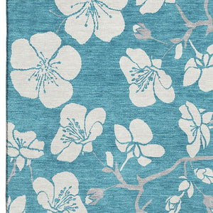 HomeRoots 10' X 14' Turquoise & Ivory Floral Area Rug - Washable, UV Protected, Durable for Family Spaces 681083