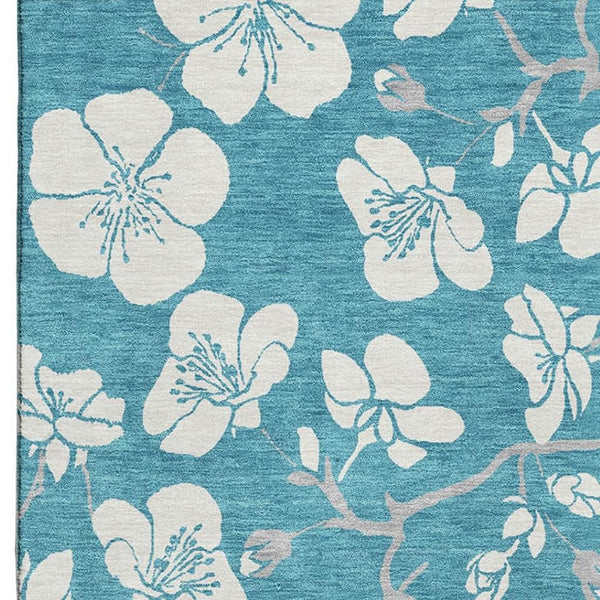 HomeRoots 10' X 14' Turquoise & Ivory Floral Area Rug - Washable, UV Protected, Durable for Family Spaces 681083