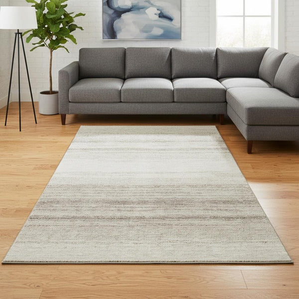 HomeRoots 8' X 10' Stylish Ivory and Beige Striped Washable Area Rug with UV Protection for Busy Homes 681123