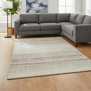 HomeRoots 9' X 12' Ivory and Beige Striped Washable Area Rug – Durable, UV-Protected, Perfect for High-Traffic Spaces 681124
