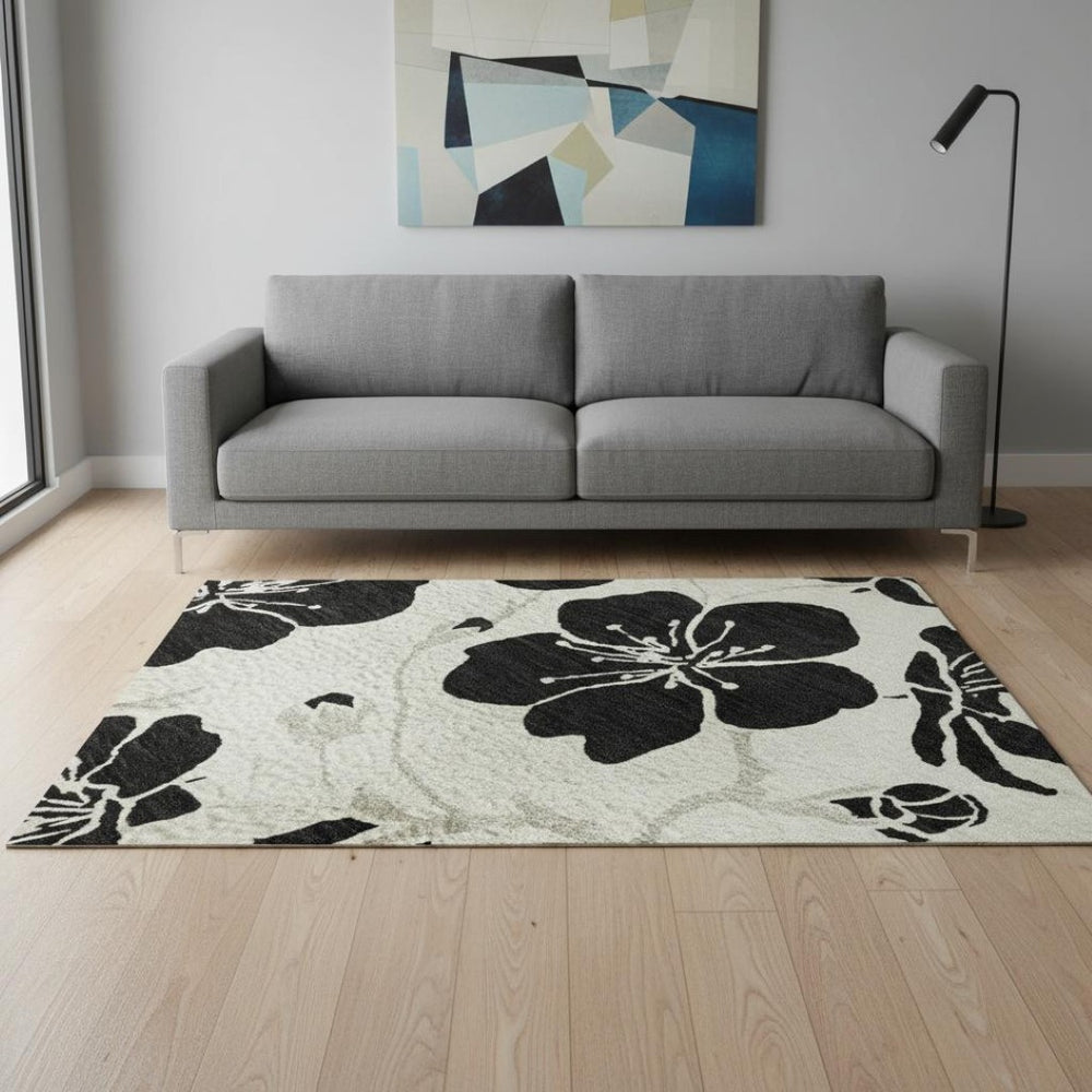HomeRoots 5' X 8' Washable Ivory and Black Floral Area Rug with UV Protection - Ideal for Homes with Kids & Pets 681157