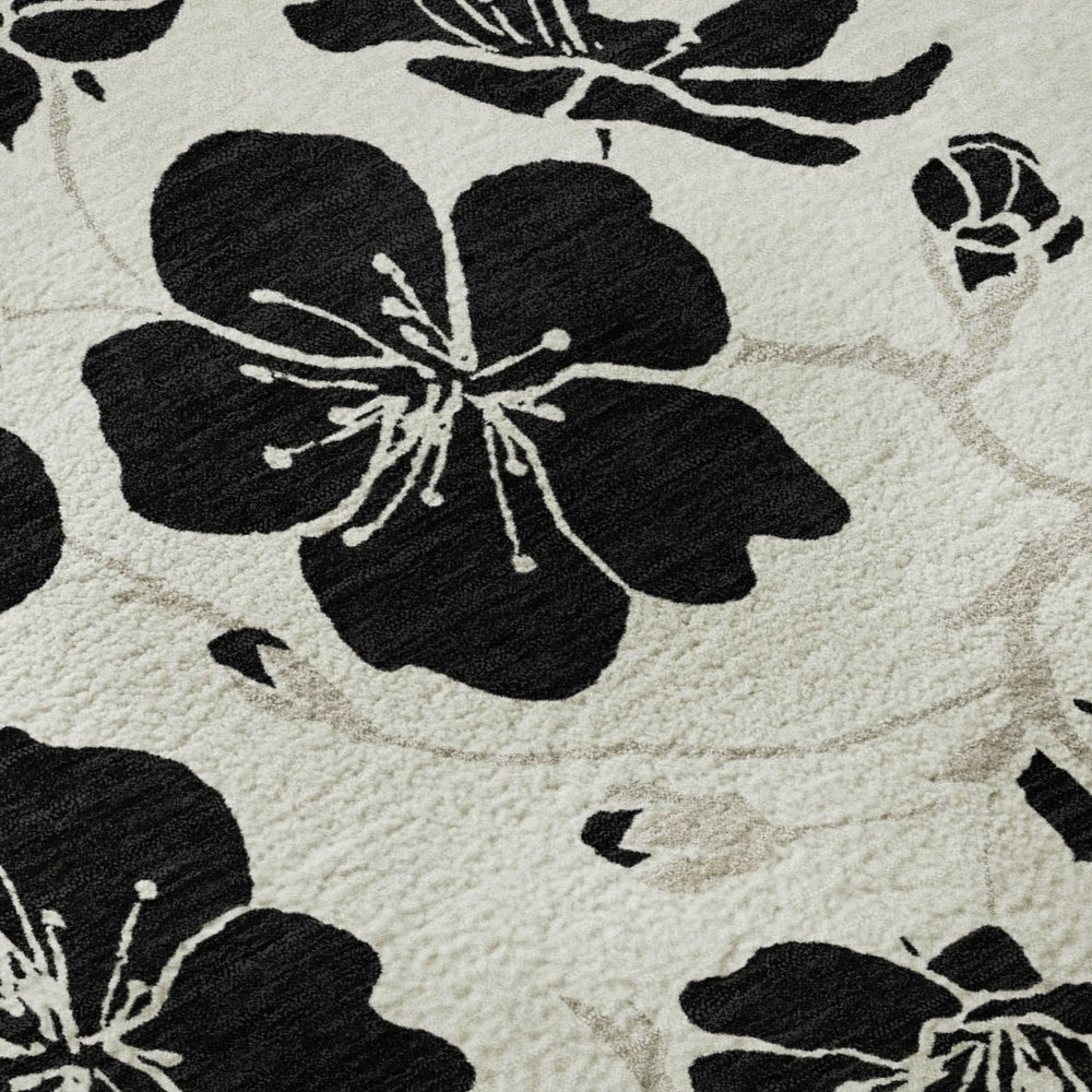 HomeRoots 5' X 8' Washable Ivory and Black Floral Area Rug with UV Protection - Ideal for Homes with Kids & Pets 681157