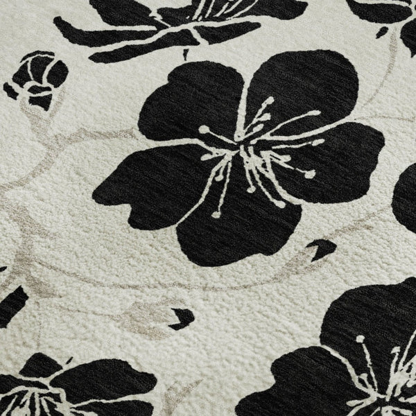 HomeRoots 5' X 8' Washable Ivory and Black Floral Area Rug with UV Protection - Ideal for Homes with Kids & Pets 681157