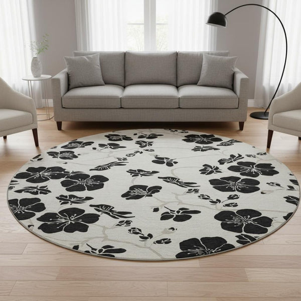 HomeRoots 8' Ivory and Black Floral Washable Round Rug - Durable, Stylish, Stain-Resistant, UV Protected Design 681158