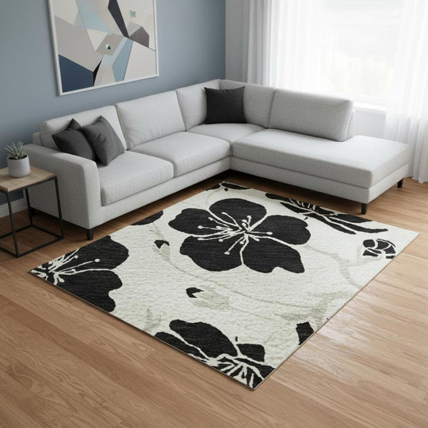 HomeRoots 10' X 14' Ivory Floral Area Rug - Stain-Resistant, Washable, UV Protected & Ideal for Family Spaces 681161