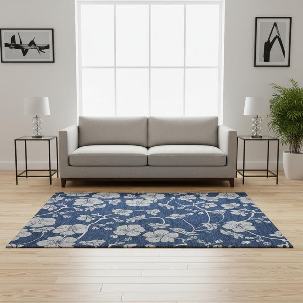 HomeRoots 5' X 8' Navy Blue Floral Area Rug - Washable, UV Protected, Stain Resistant for High-Traffic Areas 681175