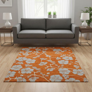 HomeRoots 5' X 8' Floral Area Rug in Orange, Gray & Ivory - Washable, UV-Protected for Kid & Pet Friendly Homes 681181