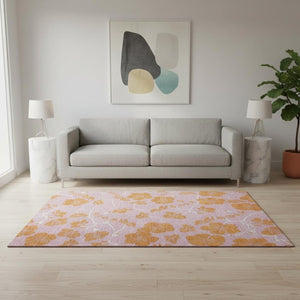 HomeRoots 5' Pink and Orange Floral Washable Area Rug - Durable, UV-Protected, Perfect for Family Spaces! 681187