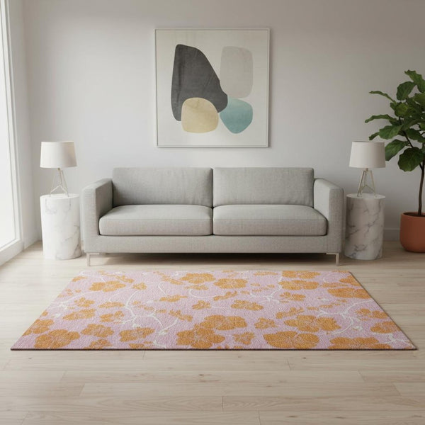 HomeRoots 5' Pink and Orange Floral Washable Area Rug - Durable, UV-Protected, Perfect for Family Spaces! 681187
