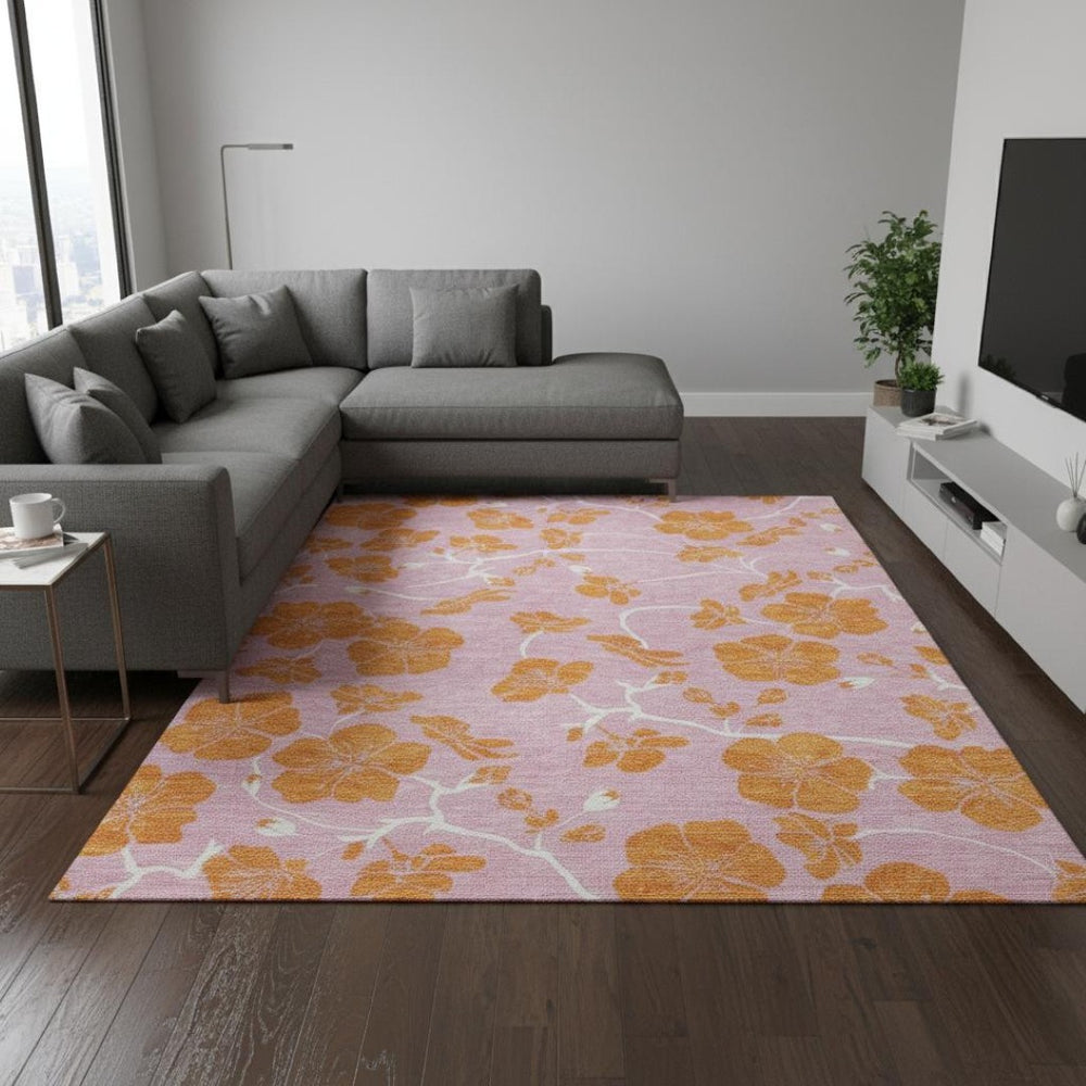 HomeRoots 10' X 14' Pink And Orange Floral Washable Area Rug - Durable, Stain-Resistant, UV Protected Elegance 681191