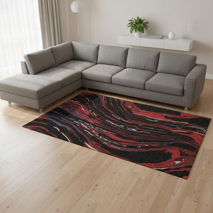 HomeRoots 10' Abstract Area Rug in Black, Red & Blue - Washable, UV Protected, Durable for High-Traffic Spaces 681365