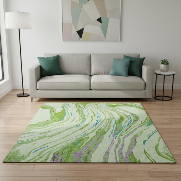 HomeRoots 5' X 8' Vibrant Abstract Area Rug – Green, Lavender & Teal, Washable, UV-Protected for Modern Spaces 681379