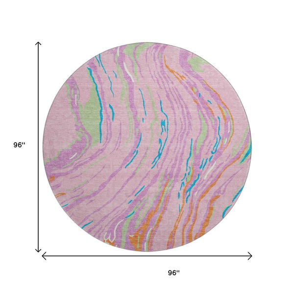 HomeRoots 8' Vibrant Pink, Green & Orange Abstract Washable Round Rug - Durable, UV-Protected, Modern Design! 681398