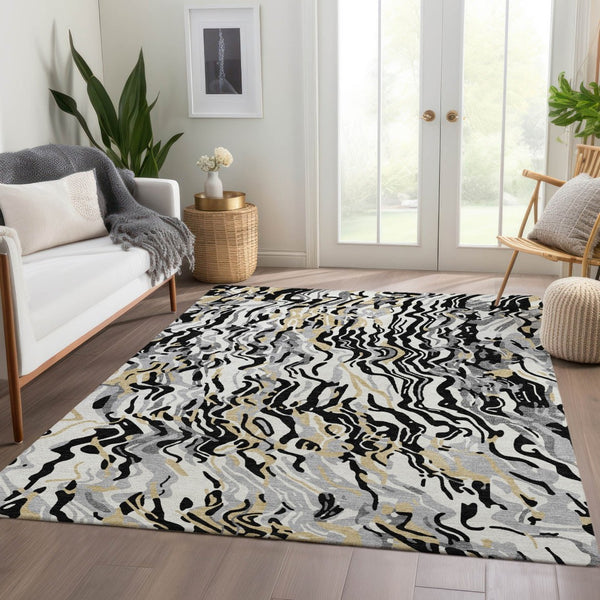 HomeRoots 5' X 8' Abstract Area Rug in Black, Gold & Ivory - Washable, UV Protected, Durable for High Traffic Homes 681421