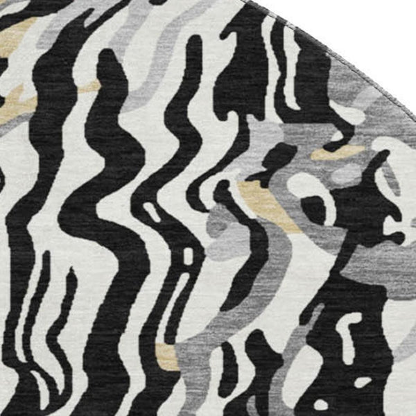 HomeRoots 8' Black Gold and Ivory Abstract Round Washable Rug with UV Protection for Modern Spaces - Durable & Stylish 681422