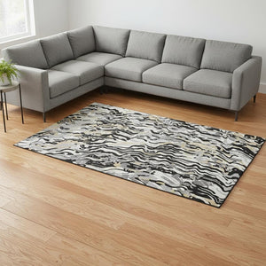 HomeRoots 10' X 14' Bold Black, Gold & Ivory Abstract Washable Area Rug with UV Protection for Modern Homes 681425
