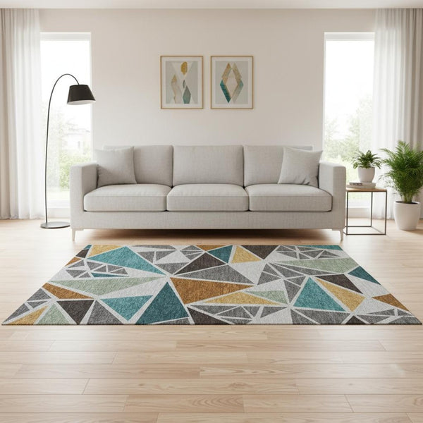 HomeRoots 5' X 8' Geometric Washable Area Rug in Gray, Teal & Copper - Stain Resistant, UV Protected Design! 681517