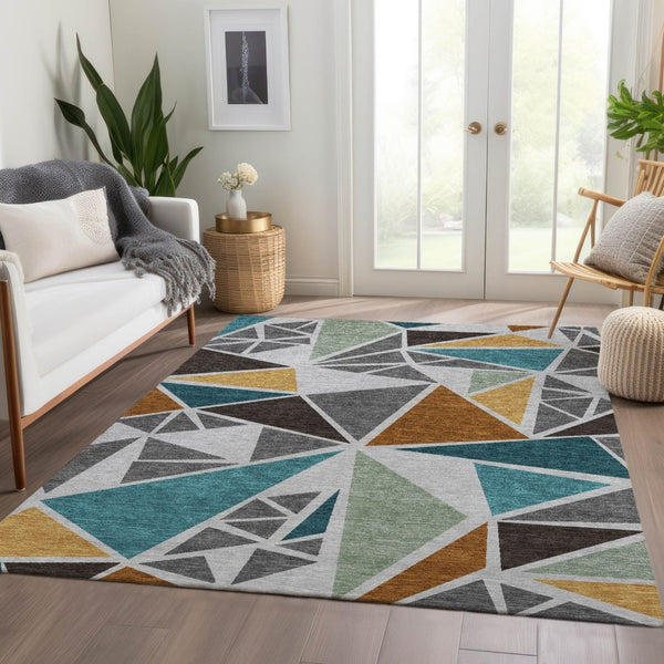 HomeRoots 9' X 12' Contemporary Geometric Washable Area Rug in Gray, Teal & Copper with UV Protection 681520