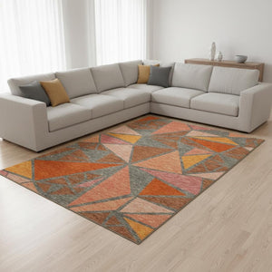 HomeRoots 8' X 10' Rust Orange & Salmon Geometric Area Rug - Washable, UV-Protected, Durable for Modern Spaces 681543
